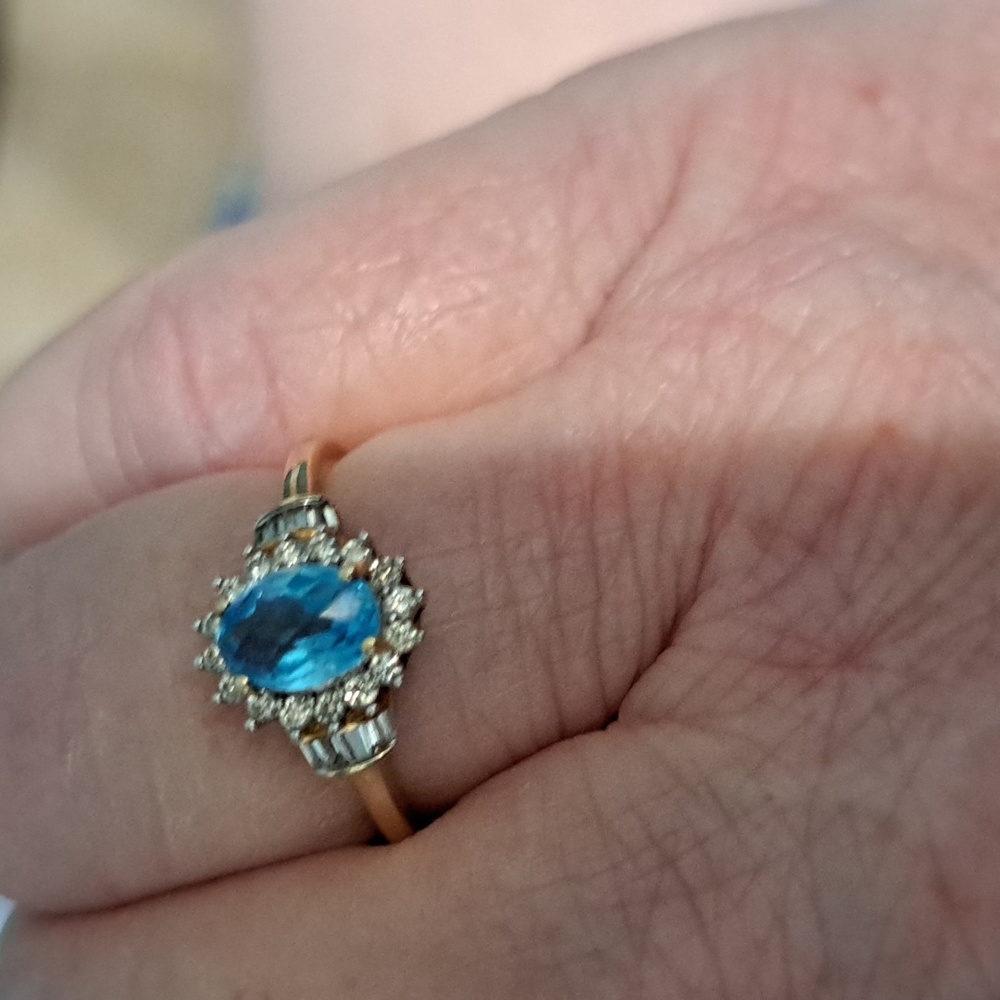 10k Swiss topaz ring (size 7) with accent diamonds and baguette side dia…